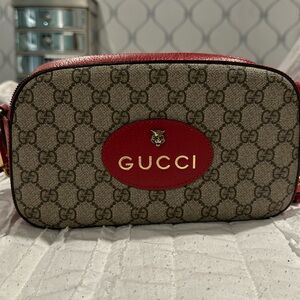 Gucci Animalier Camera Messenger
Bag GG Coated Canvas